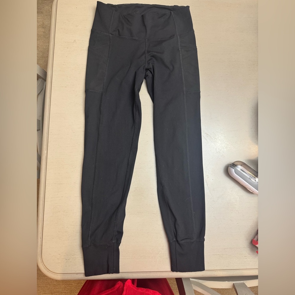 Mono B black Joggers with side tulip pockets and hidden pocket size Large EUC
